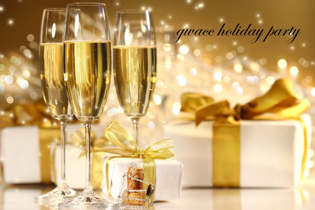 Glasses of champagne with gold ribboned gifts